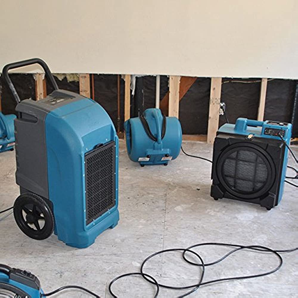 Water extraction equipment set up in a flooded home